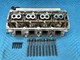 Genuine Mopar Engine Cylinder Head w/Exhaust Manifold LH 20K 68280503AE OEM
